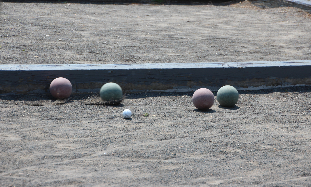 Boccia game: Disabled players enjoying a team-based sport on the court.