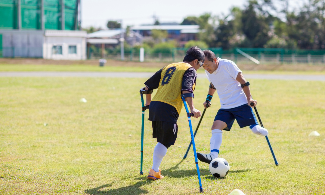 In Football physically impaired players defending a goal with team strategy.