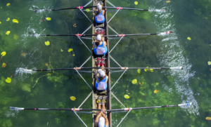 Rowing for Disabled Peoples-Disabled athlete rowing on a calm lake